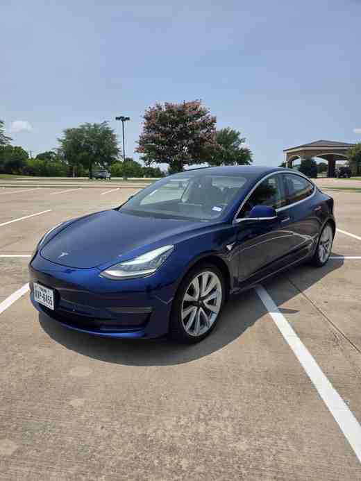 Blue Tesla Model 3 rental in Dallas–Fort Worth